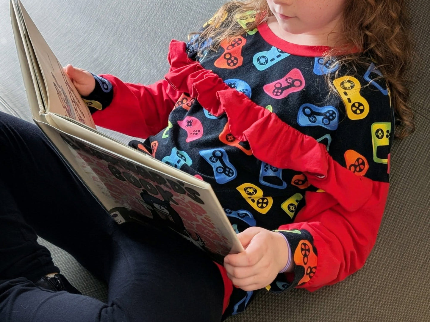 Youth Dakota Ruffle Dolman PDF